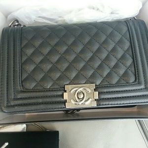 A womans Chanel hand bag Authentic  with tags